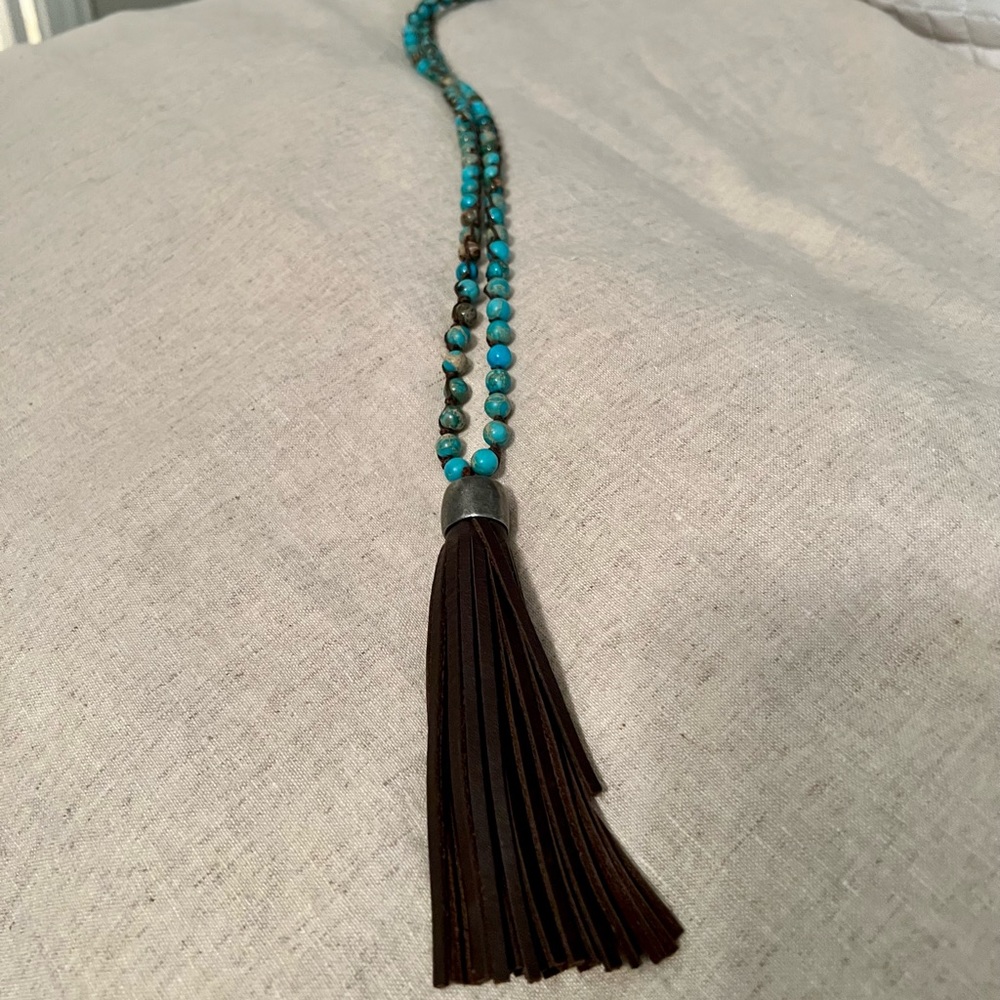 Long turquoise beaded necklace with leather fringe